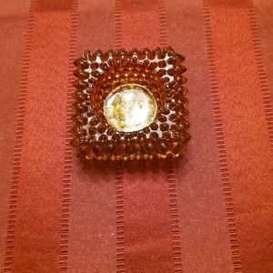 A beautiful Amber Table candle holder